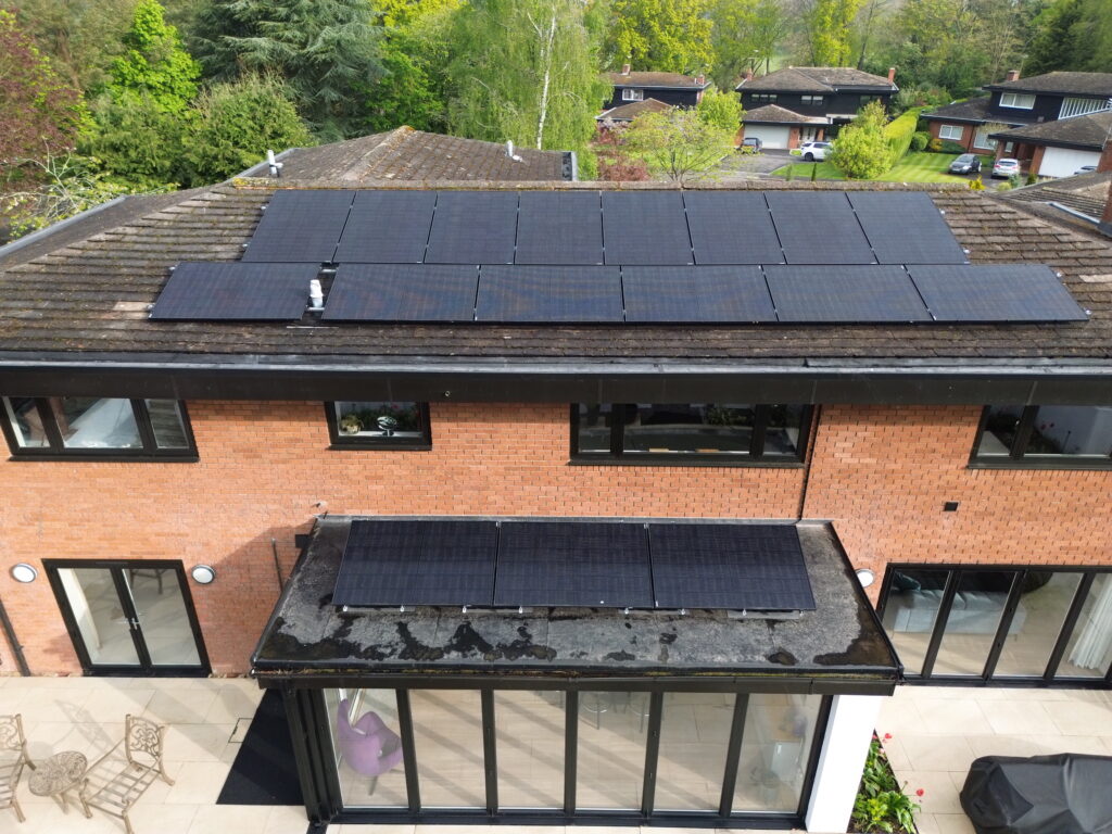 Drone shot of a solar panel installation on the roof of a home in Warwick