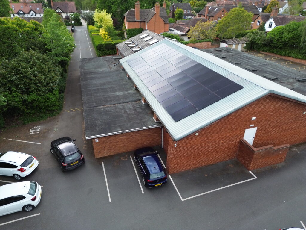Drone shot of Shottery Memorial Hall's roof solar PV installation