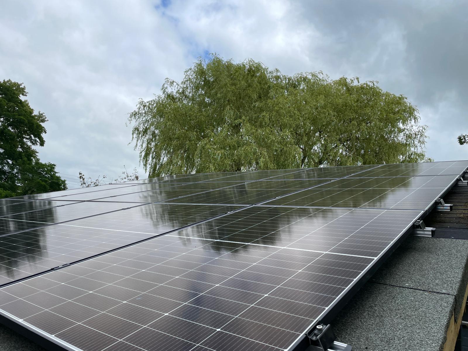 Solar panels on the roof of an outbuilding in Warwickshire
